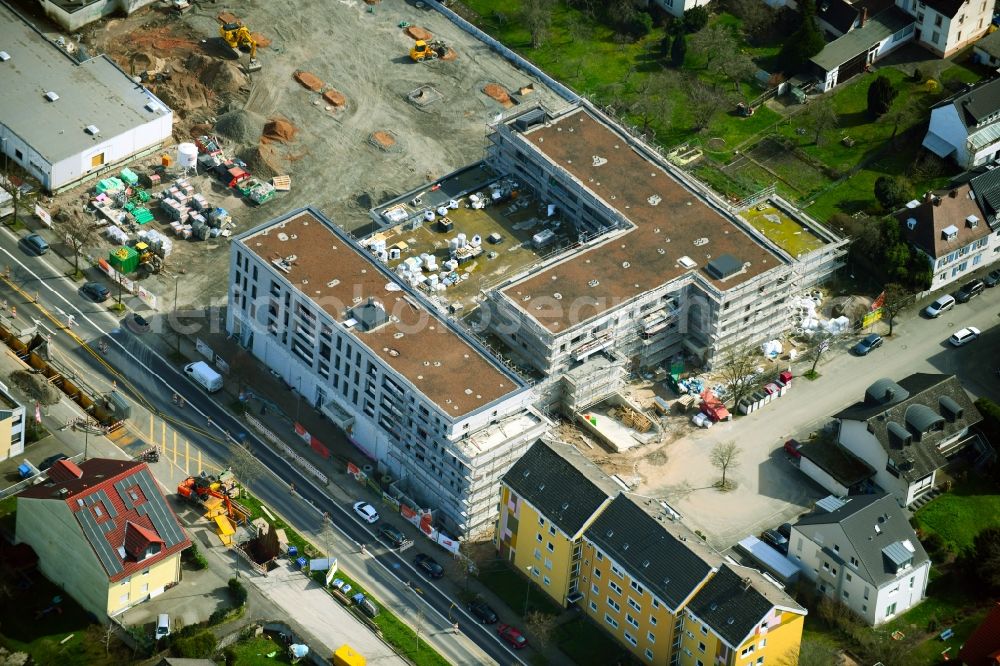 Aerial image Aschaffenburg - New construction of the building complex of the shopping center Tegut-Markt on Schillerstrasse corner Muellerstrasse in the district Damm in Aschaffenburg in the state Bavaria, Germany