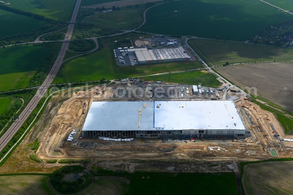 Dummerstorf from the bird's eye view: Construction site to build a new building complex on the site of the logistics center Amazon in Dummerstorf in the state Mecklenburg - Western Pomerania, Germany