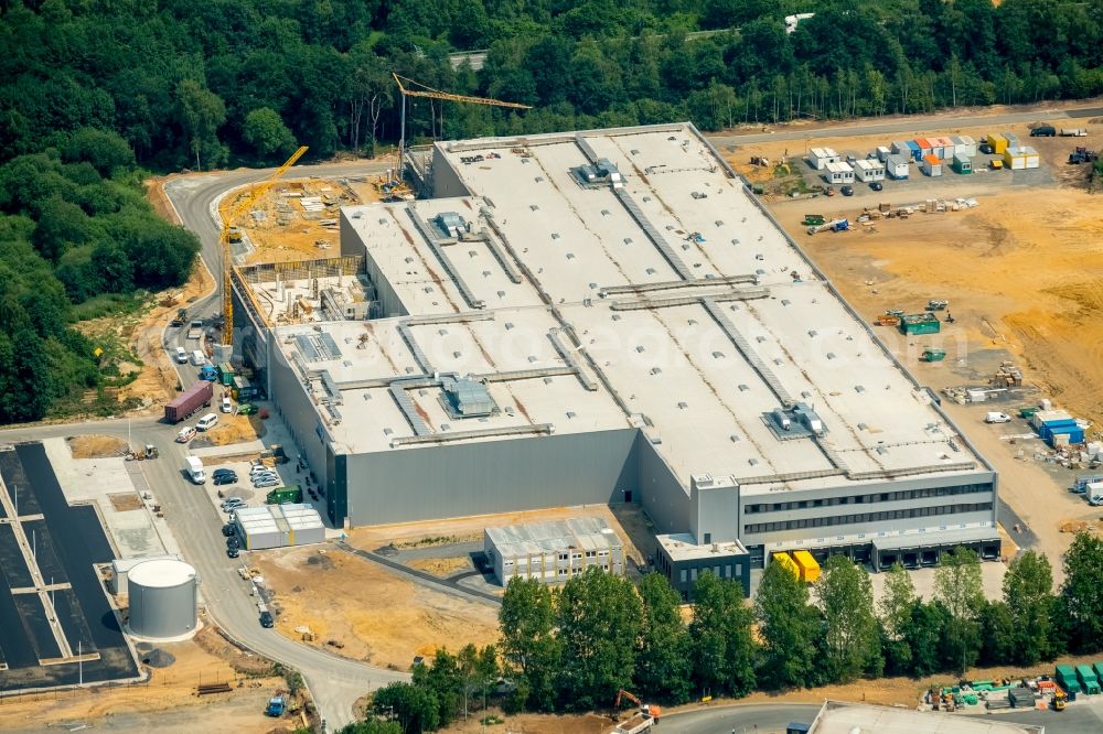 Dorsten from above - Construction site to build a new building complex on the site of the logistics center arvato of Bertelsmann SE & Co. KGaA along the Buerer Strasse to the Hervester Strasse in Dorsten in the state North Rhine-Westphalia, Germany