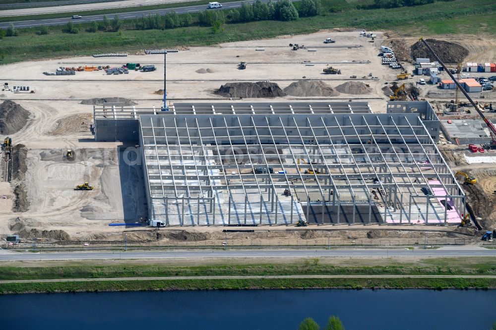 Wustermark from above - Construction site to build a new building complex on the site of the logistics center of Brueof Schlau GmbH & Co. KG in Wustermark in the state Brandenburg, Germany