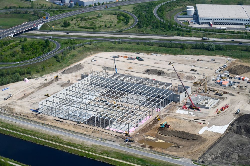 Aerial image Wustermark - Construction site to build a new building complex on the site of the logistics center of Brueof Schlau GmbH & Co. KG in Wustermark in the state Brandenburg, Germany