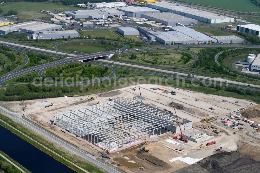 Aerial photograph Wustermark - Construction site to build a new building complex on the site of the logistics center of Brueof Schlau GmbH & Co. KG in Wustermark in the state Brandenburg, Germany