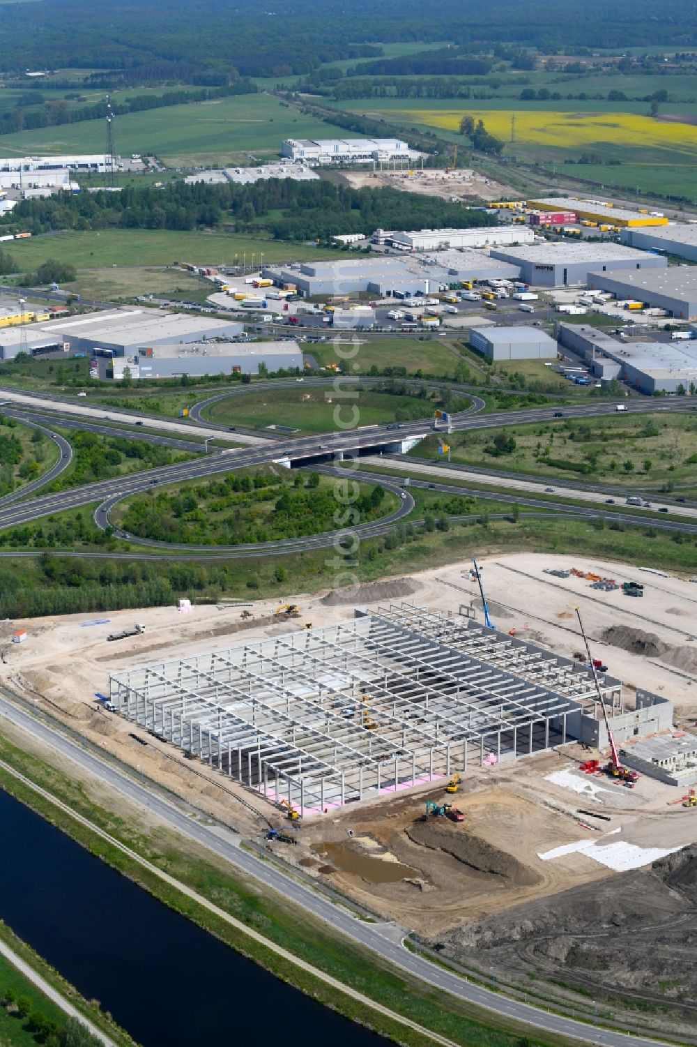 Wustermark from above - Construction site to build a new building complex on the site of the logistics center of Brueof Schlau GmbH & Co. KG in Wustermark in the state Brandenburg, Germany