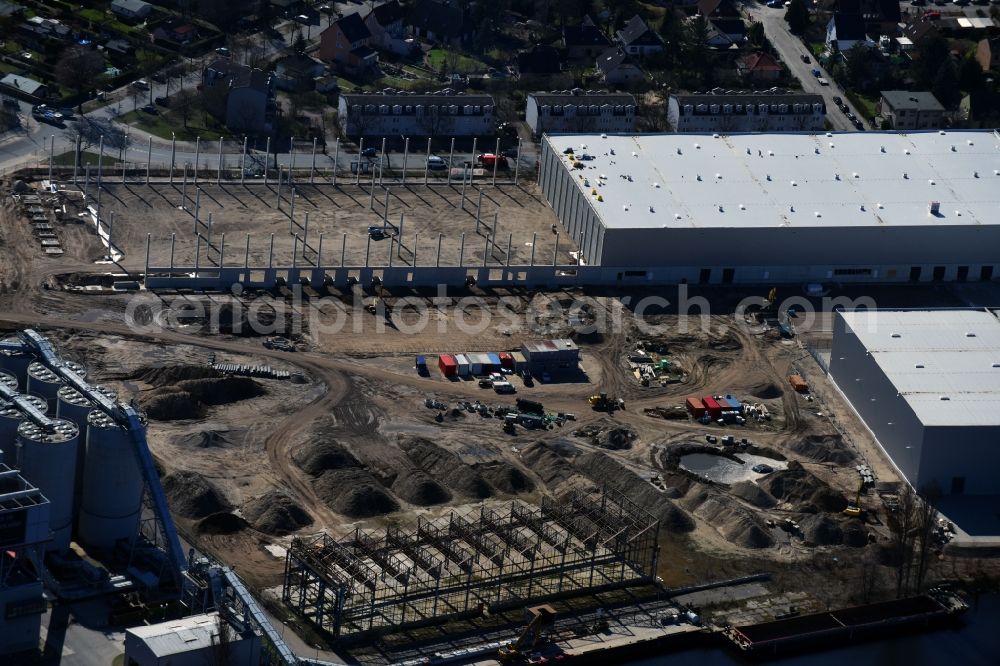 Berlin from above - Construction site to build a new building complex on the site of the logistics center of DIBAG Industriebau AG on Kanalstrasse in the district Rudow in Berlin