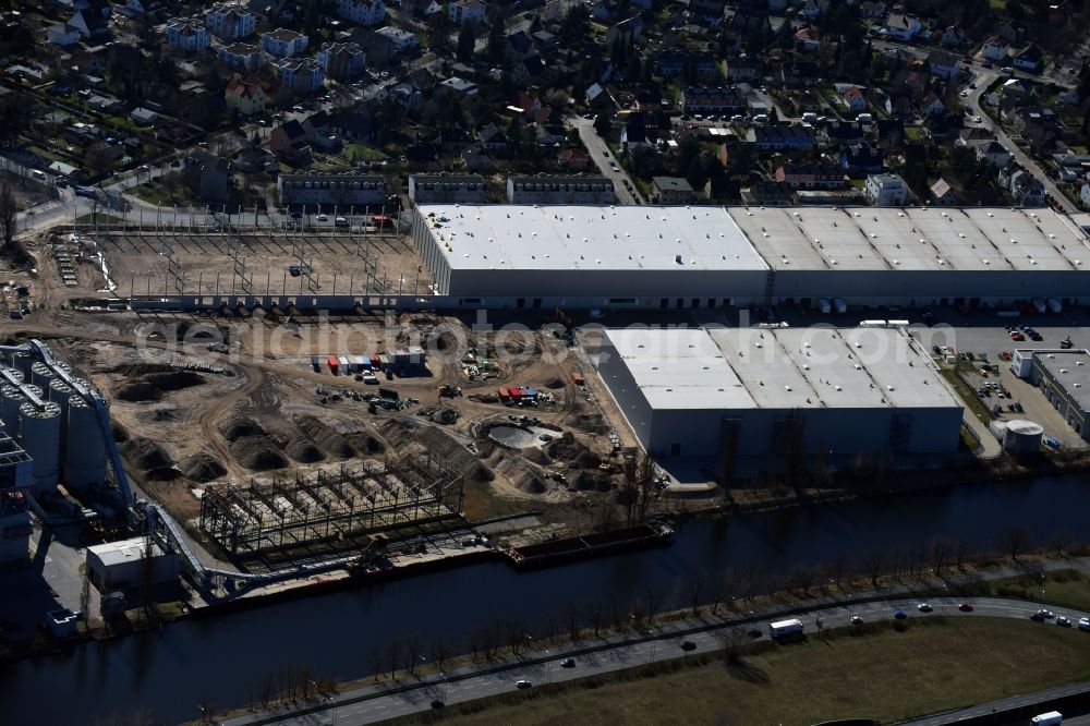 Berlin from the bird's eye view: Construction site to build a new building complex on the site of the logistics center of DIBAG Industriebau AG on Kanalstrasse in the district Rudow in Berlin