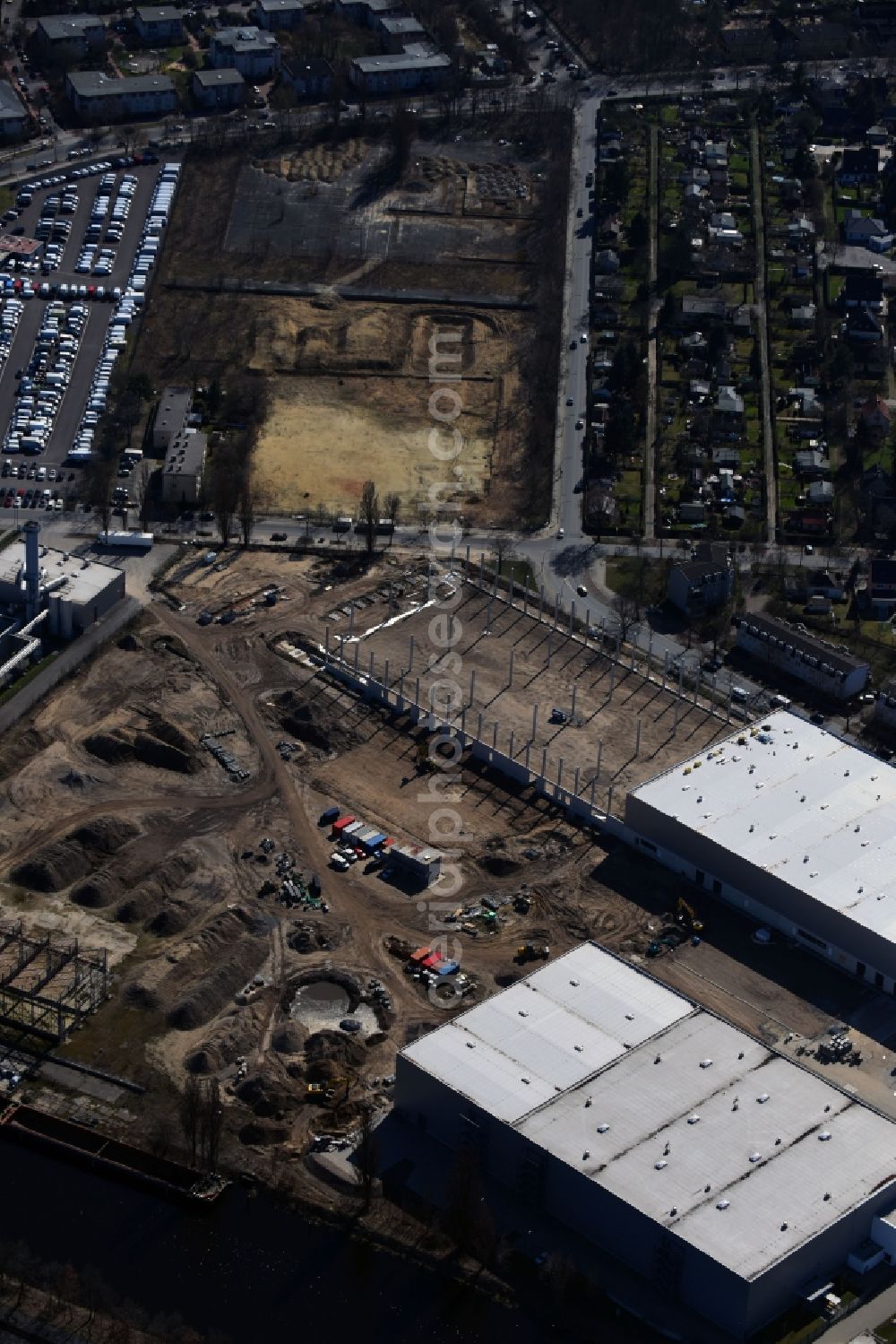 Berlin from above - Construction site to build a new building complex on the site of the logistics center of DIBAG Industriebau AG on Kanalstrasse in the district Rudow in Berlin