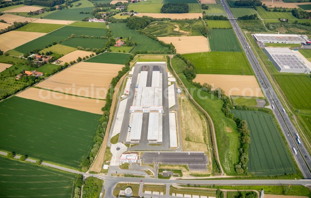 Hamm from the bird's eye view: Construction site to build a new building complex on the site of the logistics center of DPD Deutschland GmbH on Osterboenener Weg in Hamm in the state North Rhine-Westphalia, Germany