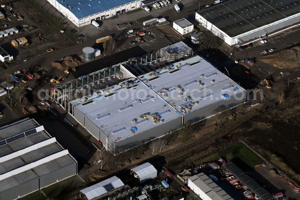 Hoppegarten from above - Construction site to build a new building complex on the site of the logistics center of Rhenus Home Delivery GmbH in the district Dahlwitz-Hoppegarten in Hoppegarten in the state Brandenburg, Germany