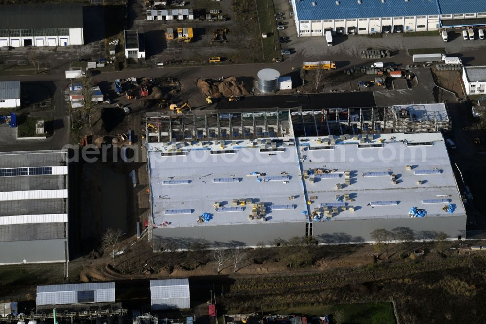 Hoppegarten from the bird's eye view: Construction site to build a new building complex on the site of the logistics center of Rhenus Home Delivery GmbH in the district Dahlwitz-Hoppegarten in Hoppegarten in the state Brandenburg, Germany