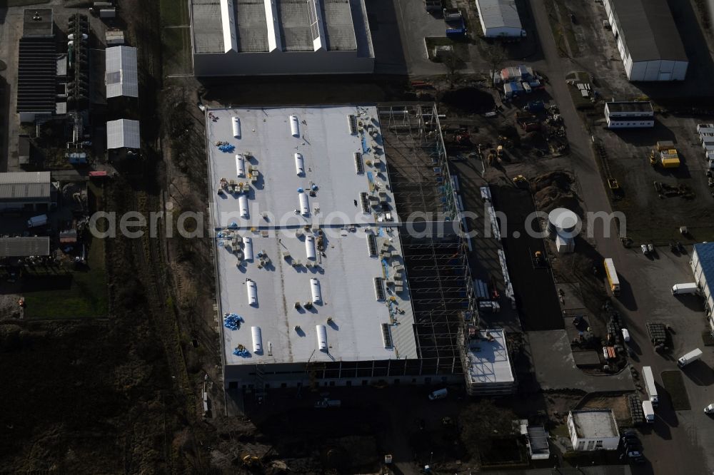 Aerial photograph Hoppegarten - Construction site to build a new building complex on the site of the logistics center of Rhenus Home Delivery GmbH in the district Dahlwitz-Hoppegarten in Hoppegarten in the state Brandenburg, Germany