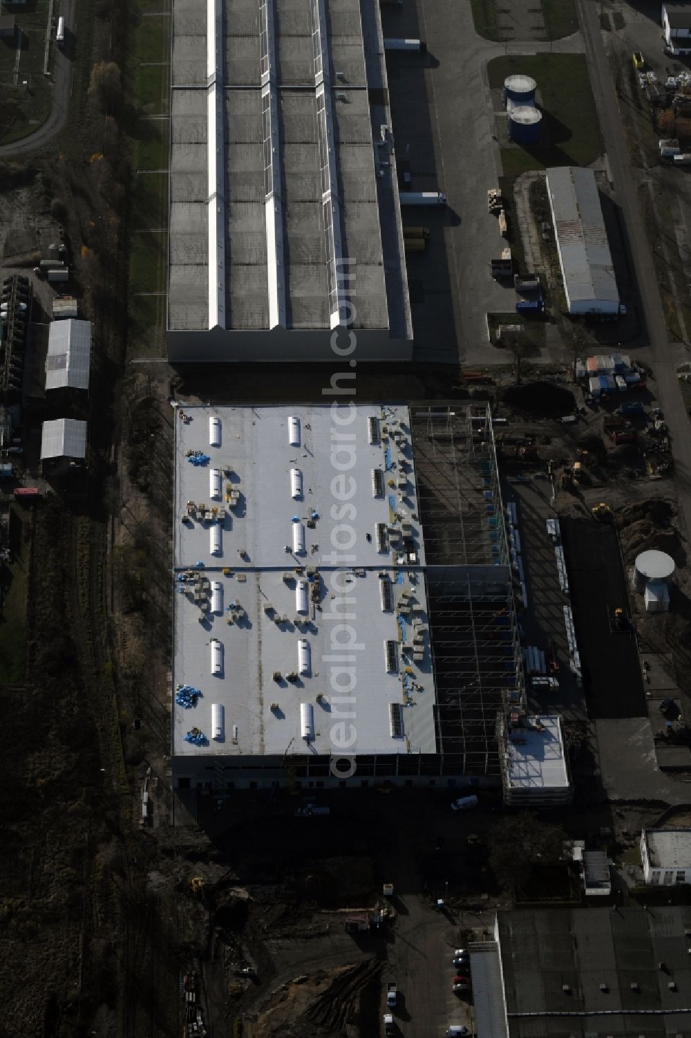 Hoppegarten from above - Construction site to build a new building complex on the site of the logistics center of Rhenus Home Delivery GmbH in the district Dahlwitz-Hoppegarten in Hoppegarten in the state Brandenburg, Germany