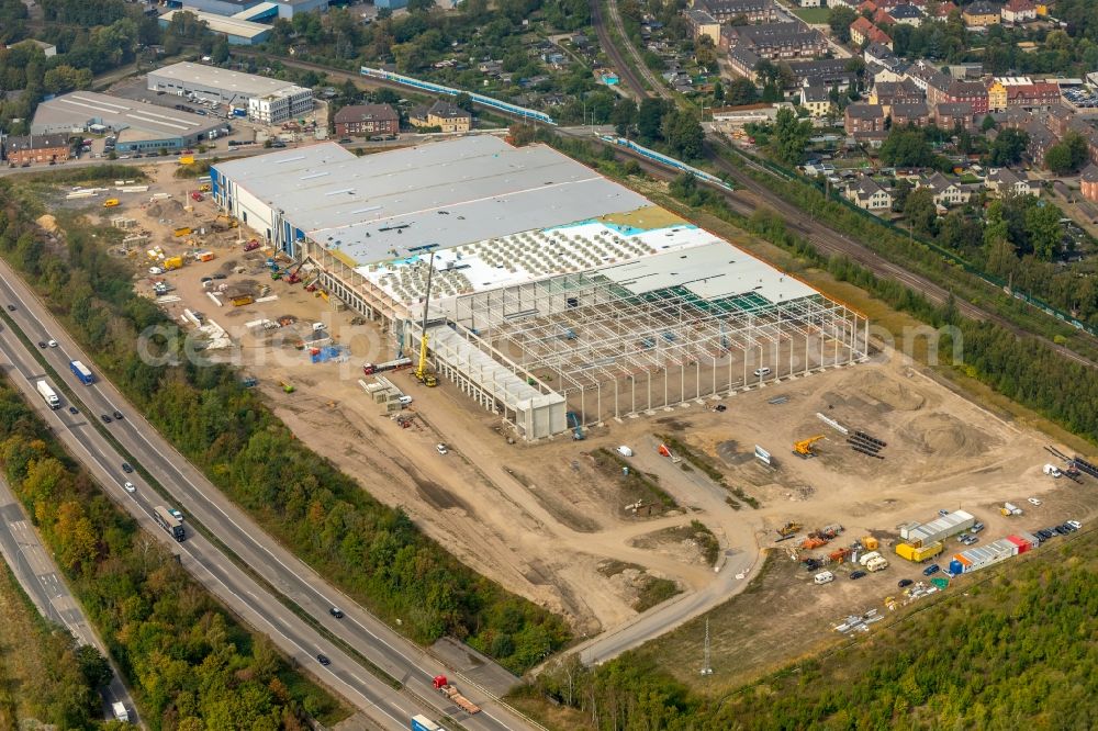 Gelsenkirchen from the bird's eye view: Construction site to build a new building complex on the site of the logistics center on Uechtingstrasse in front of motorway BAB A42 in Gelsenkirchen in the state North Rhine-Westphalia, Germany