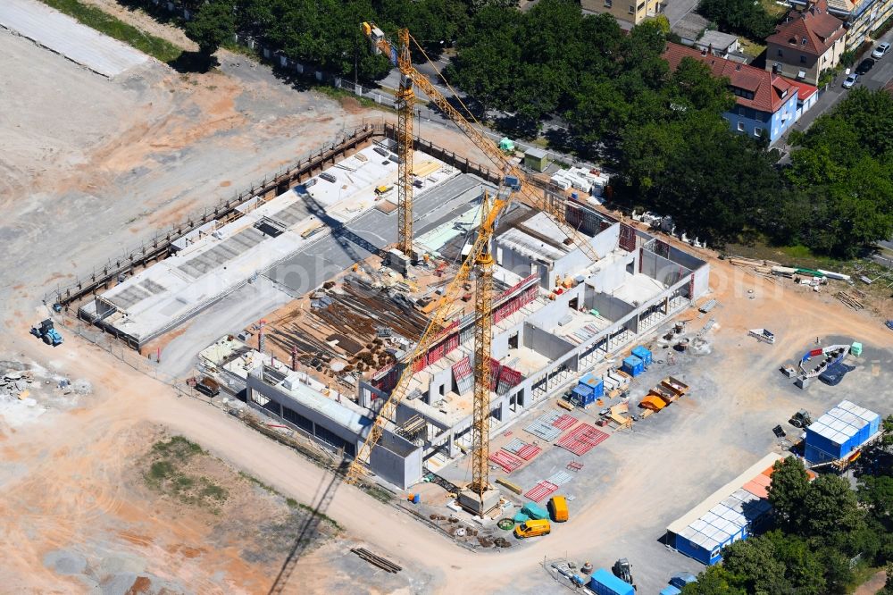 Schweinfurt from above - Construction of a building complex of university Fachhochschule Wuerzburg-Schweinfurt on Franz-Schubert-Strasse in Schweinfurt in the state Bavaria, Germany