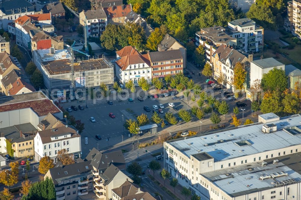 Aerial photograph Gladbeck - Construction site to build a new building complex with apartments on the market square in Gladbeck in North Rhine-Westphalia. The developer is company property Jockenhoefer u. Babiel according to the plans of Strelzig + Klump Dipl.-Ing. Architects AKNW