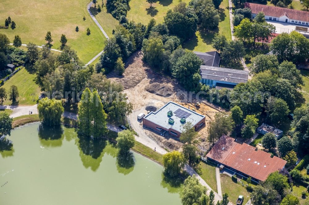 Aerial image Hamm - Construction site for the new building of a building next to the Kindertagesstaette Blauland on Theo-Hoelscher-Weg in Hamm in the state North Rhine-Westphalia, Germany