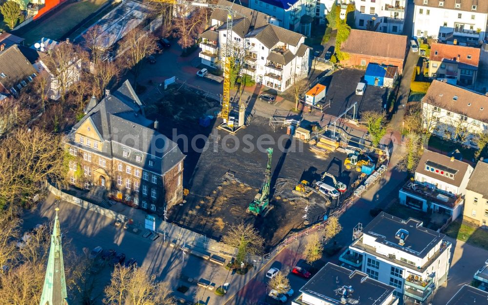 Holzwickede from the bird's eye view: Construction site of Town Hall building of the city administration als Erweiterungsbau Am Markt - Poststrasse in the district Brackel in Holzwickede in the state North Rhine-Westphalia, Germany