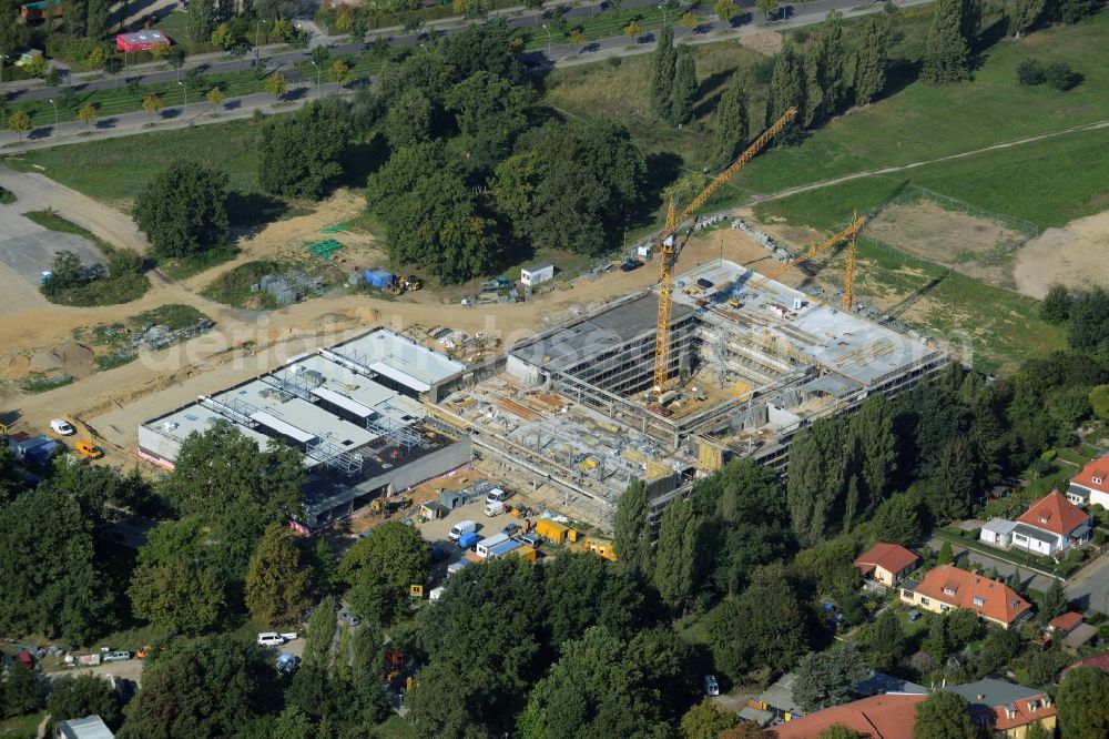 Aerial photograph Potsdam - Construction site for the new building of Leonardo-Da-Vinci school on Esplanade street in Potsdam in the state of Brandenburg. The school is being built on Bornstedter Feld on site of the former federal garden show BUGA and opposite the Biospaehre Potsdam area