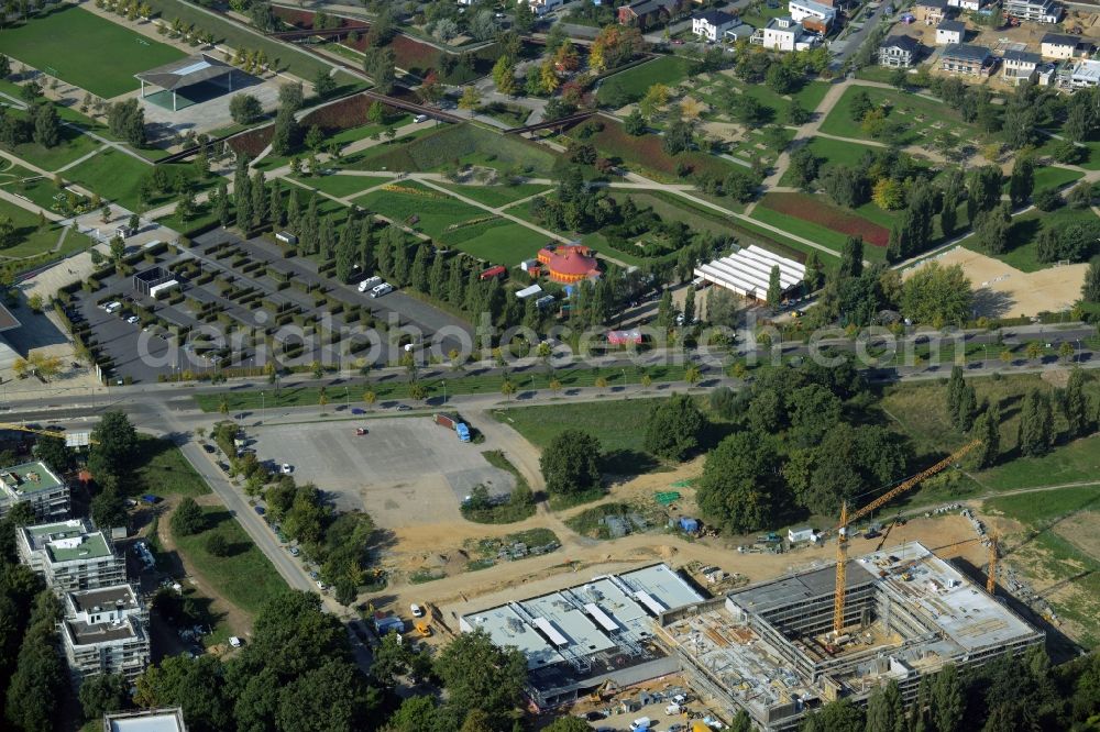 Aerial image Potsdam - Construction site for the new building of Leonardo-Da-Vinci school on Esplanade street in Potsdam in the state of Brandenburg. The school is being built on Bornstedter Feld on site of the former federal garden show BUGA and opposite the Biospaehre Potsdam area