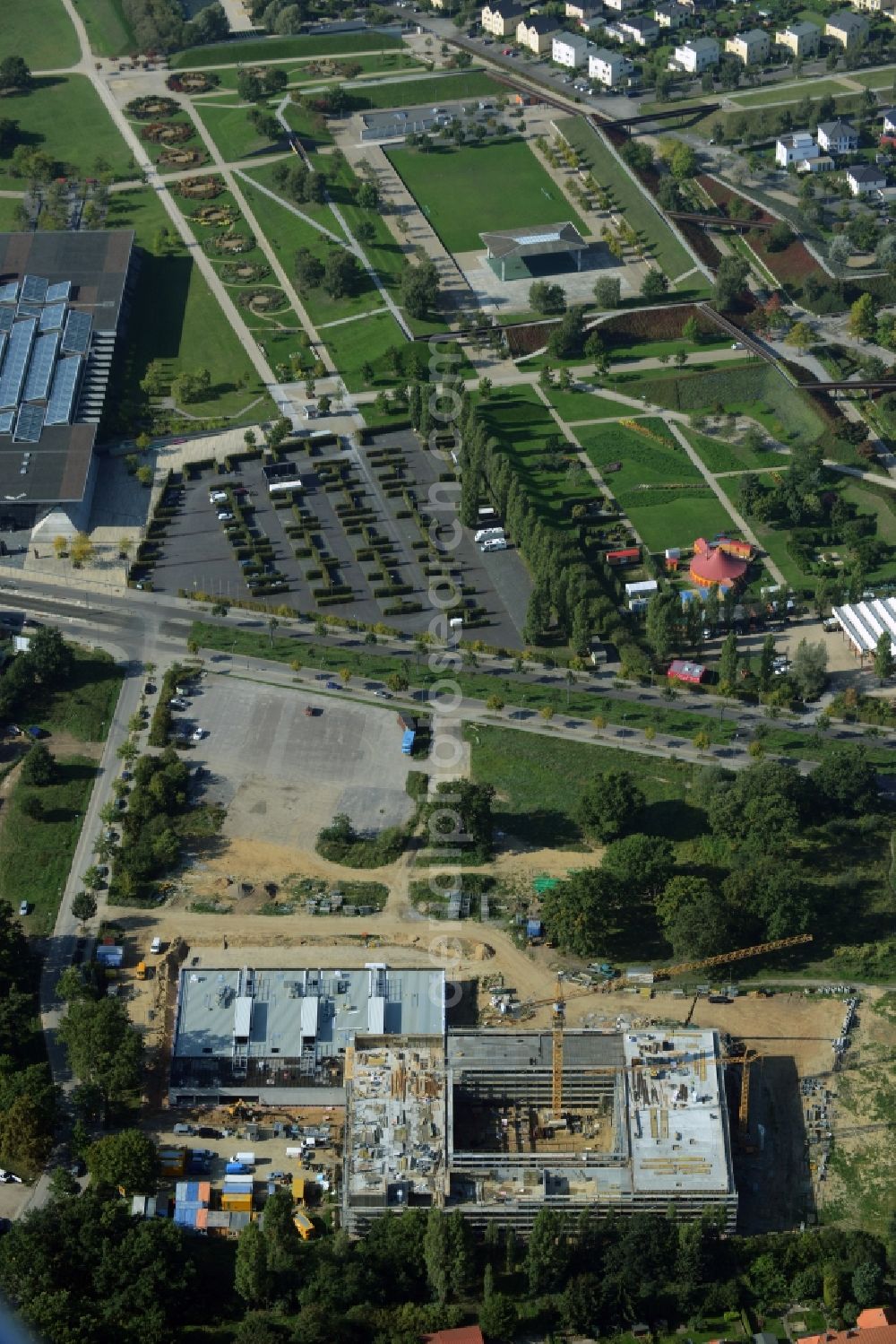 Potsdam from above - Construction site for the new building of Leonardo-Da-Vinci school on Esplanade street in Potsdam in the state of Brandenburg. The school is being built on Bornstedter Feld on site of the former federal garden show BUGA and opposite the Biospaehre Potsdam area