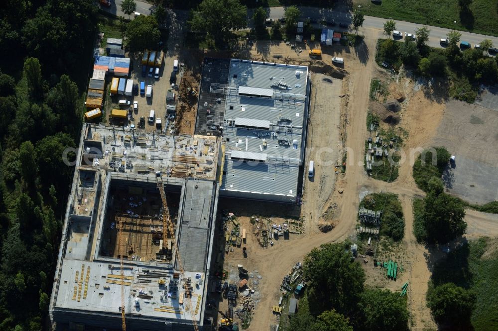 Aerial photograph Potsdam - Construction site for the new building of Leonardo-Da-Vinci school on Esplanade street in Potsdam in the state of Brandenburg. The school is being built on Bornstedter Feld on site of the former federal garden show BUGA and opposite the Biospaehre Potsdam area