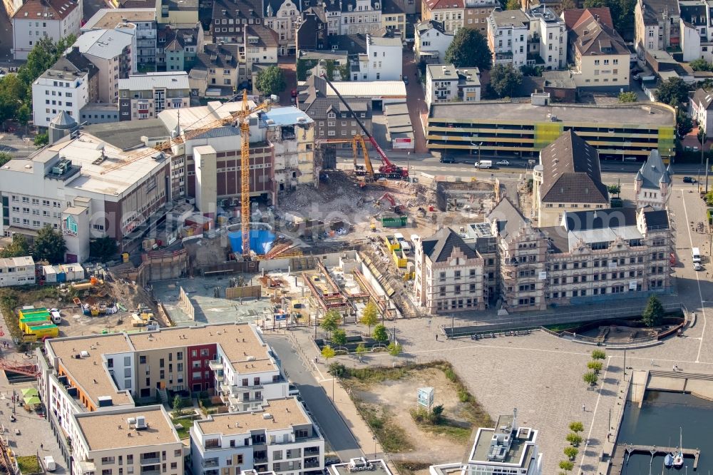 Dortmund from above - Construction site to build a new commercial building next to the Stiftsforum in the Fassstrasse in Dortmund in the state North Rhine-Westphalia. Leading construction company is Aug. Prien GmbH & Co. KG.