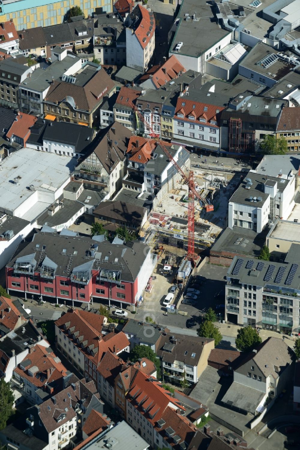 Osnabrück from the bird's eye view: Construction site for the new building of a commercial and business building in the town centre of Osnabrueck in the state of Lower Saxony