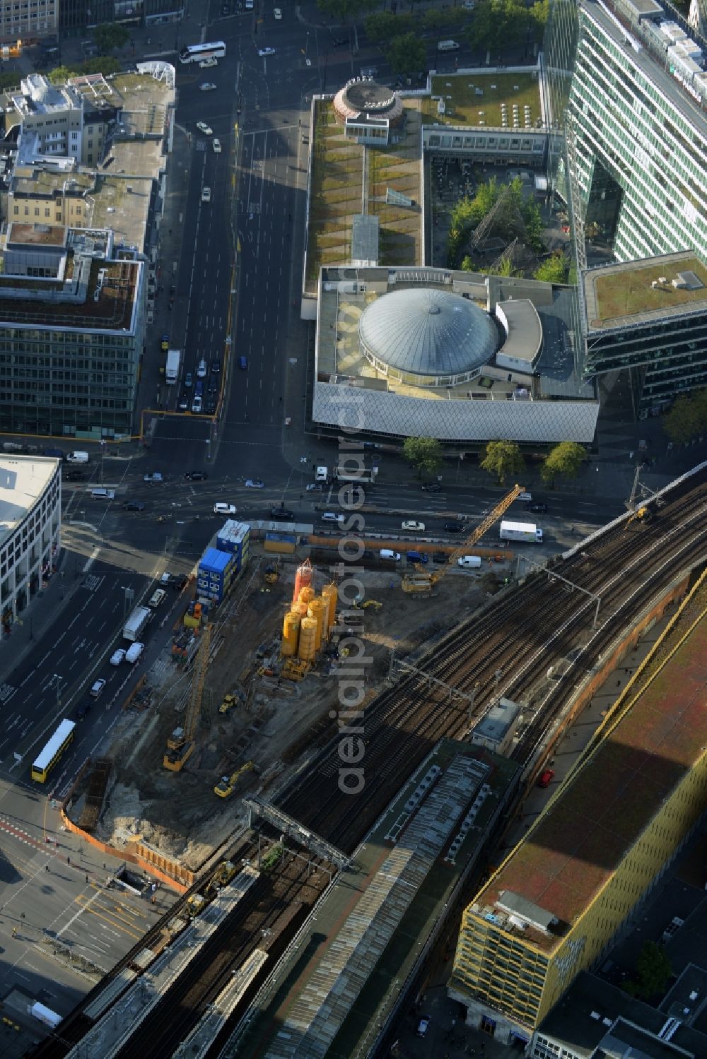 Aerial image Berlin - Construction site for the new building of a business building with stores at Zoo station on Joachimsthaler Strasse in Berlin in Germany. The new building was designed by Hascher Jehle and will be put in place next to the railway tracks and opposite the Karstadt department store