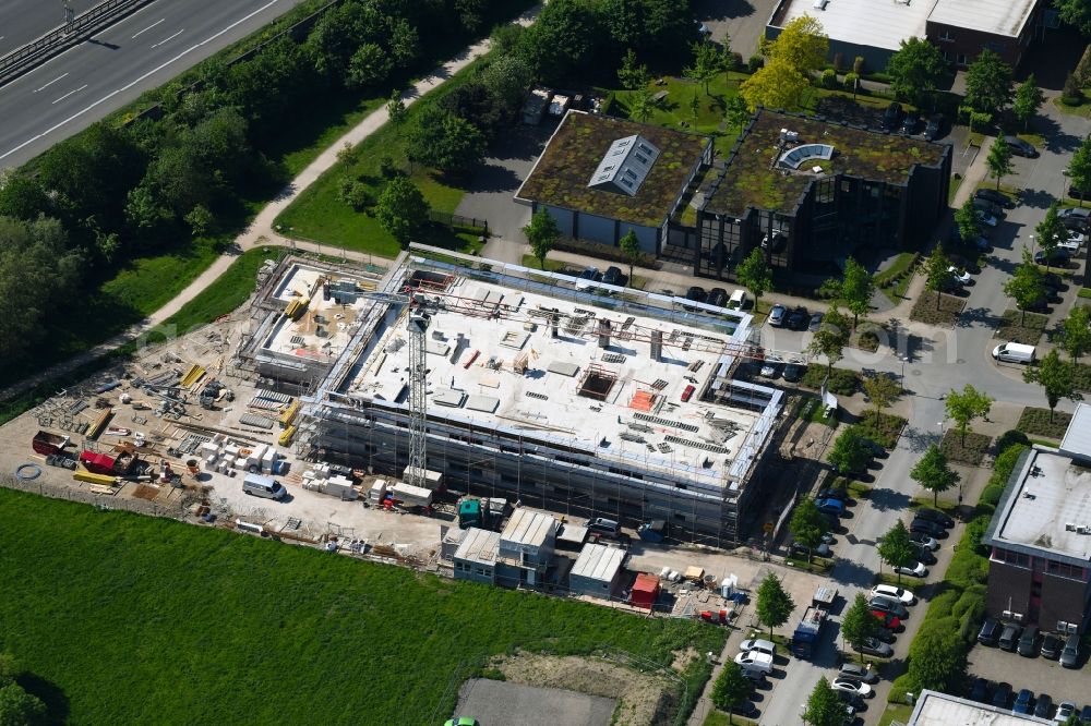 Gelsenkirchen from the bird's eye view: Construction site for a health center and medical center of Janssen Grundstuecksgesellschaft mbH on Ludwig-Erhard-Strasse in Gelsenkirchen in the state North Rhine-Westphalia, Germany