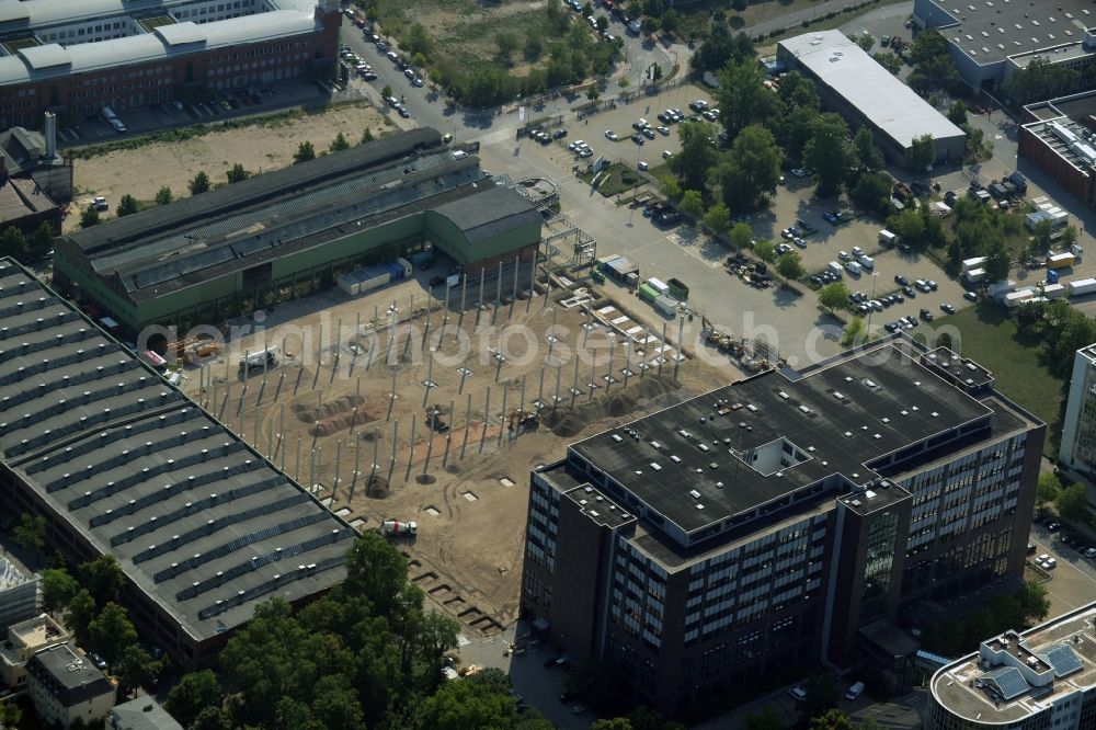 Aerial photograph Berlin - Construction site for the new building of the Gewerbe- und Logstikpark Dock 100 of the BEOS AG in Berlin in Germany