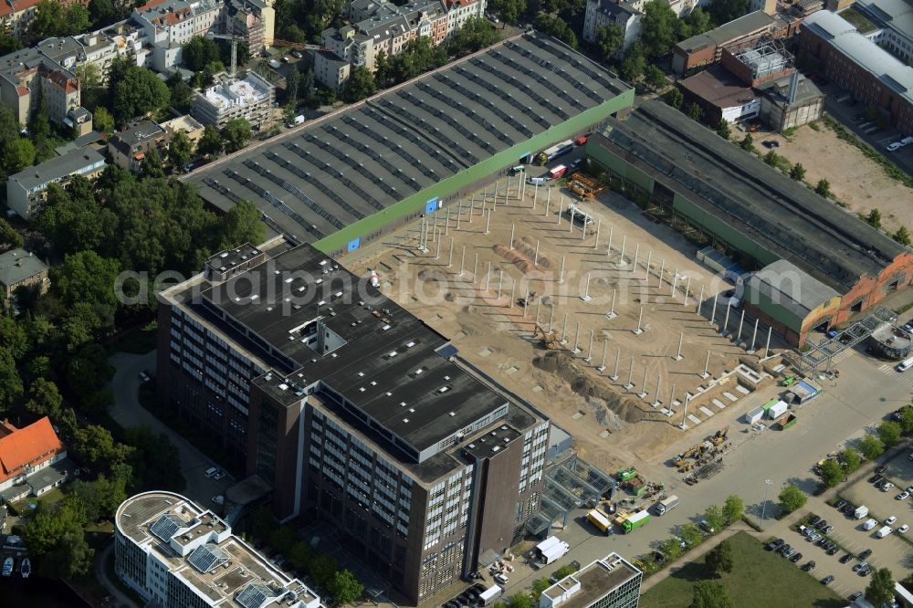 Aerial image Berlin - Construction site for the new building of the Gewerbe- und Logstikpark Dock 100 of the BEOS AG in Berlin in Germany