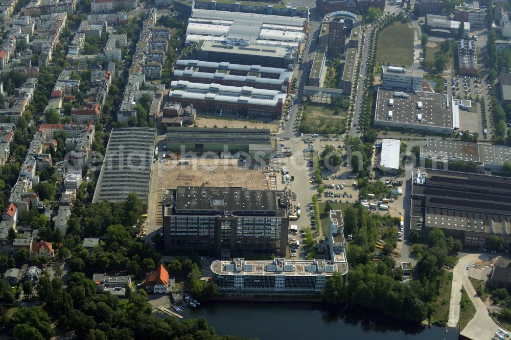 Aerial photograph Berlin - Construction site for the new building of the Gewerbe- und Logstikpark Dock 100 of the BEOS AG in Berlin in Germany