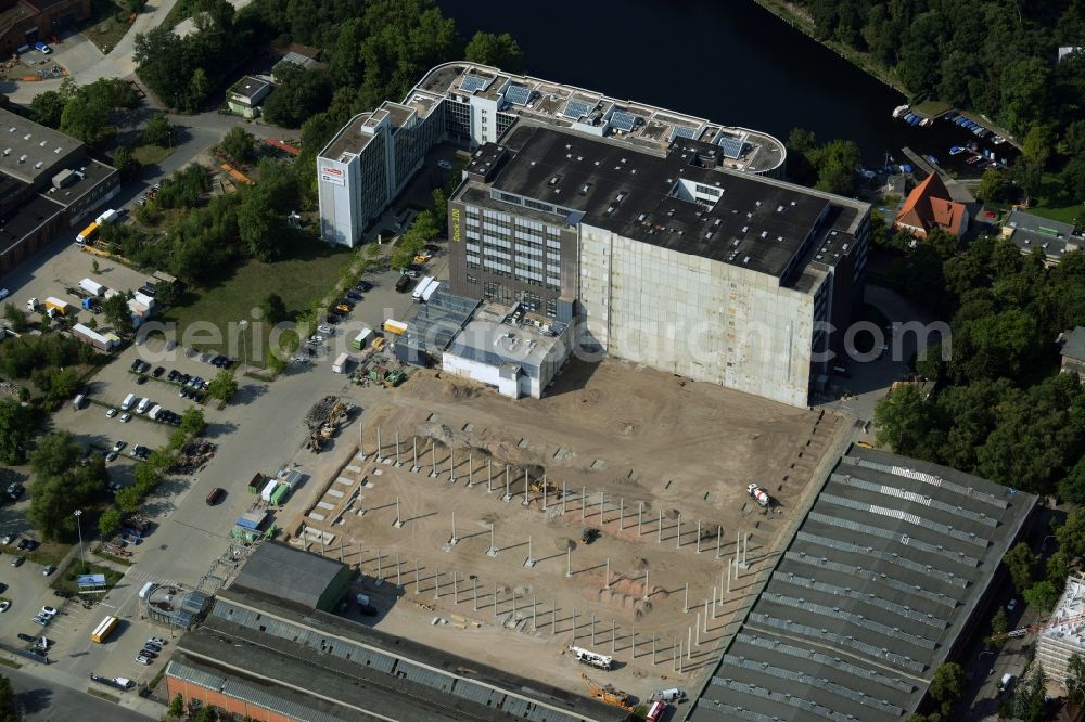 Aerial image Berlin - Construction site for the new building of the Gewerbe- und Logstikpark Dock 100 of the BEOS AG in Berlin in Germany