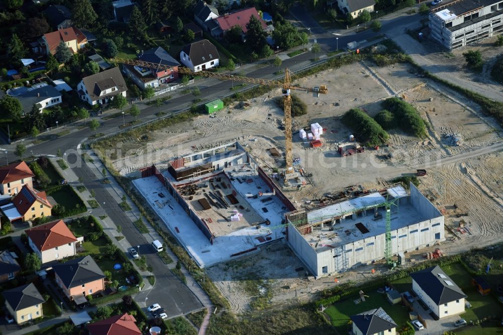 Aerial photograph Berlin - Construction site of a primary school on Habichtshorst in the Biesdorf part of the district of Marzahn-Hellersdorf in Berlin. The premises will include a sports arena and a schoolyard and was developed by the architectural company ReimarHerbst