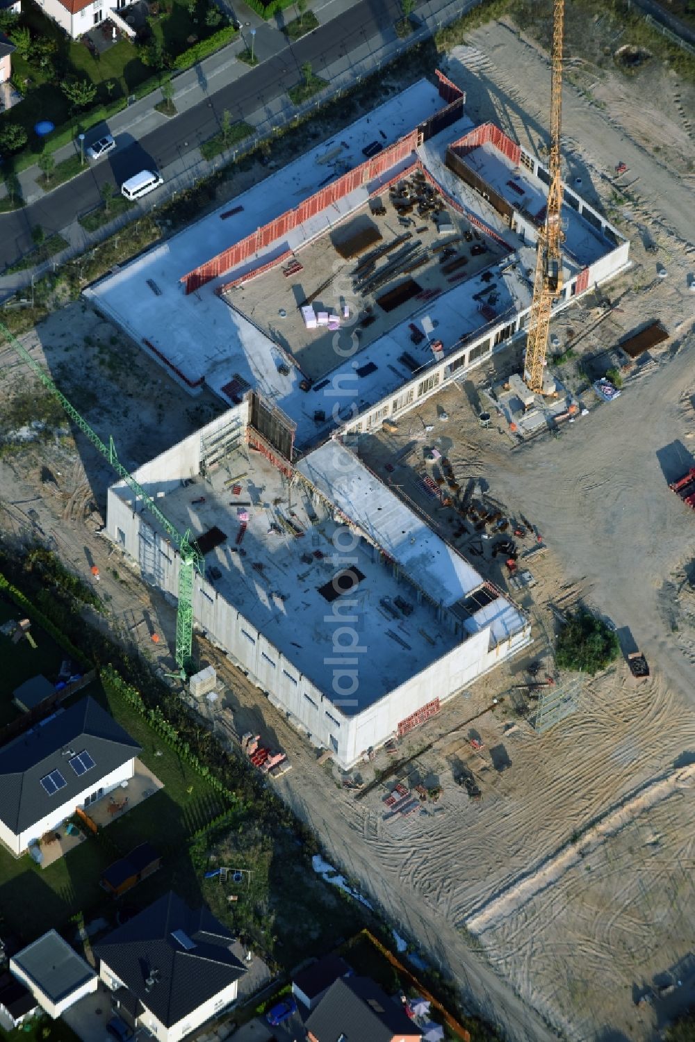 Berlin from above - Construction site of a primary school on Habichtshorst in the Biesdorf part of the district of Marzahn-Hellersdorf in Berlin. The premises will include a sports arena and a schoolyard and was developed by the architectural company ReimarHerbst