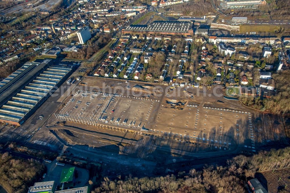 Bochum from the bird's eye view: Building site to the new building of hall new buildings in Windhausstrasse to the east of the Reinhold Mendritzki Kaltwalzwerk GmbH & Co. KG in the district of Weitmar in Bochum in the federal state North Rhine-Westphalia