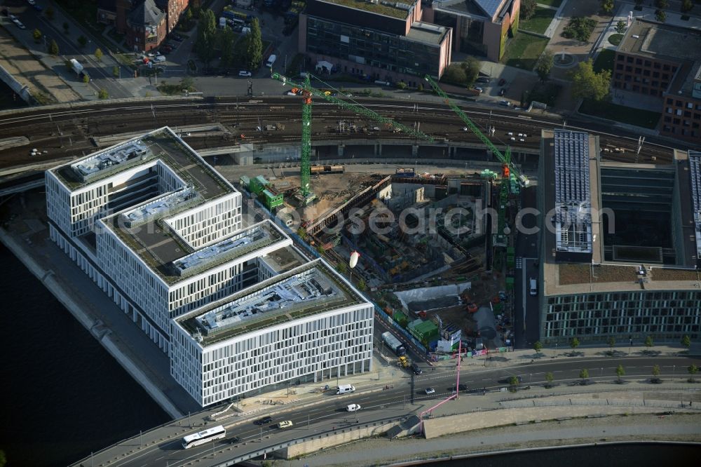 Aerial image Berlin - Construction site for the new building of the House of the Future on Kapelleufer riverbank in Berlin in Germany. The building is being built after a design by Richter und Musikowski between the seat of the BMBF ministery and the office building Humbolthafeneins