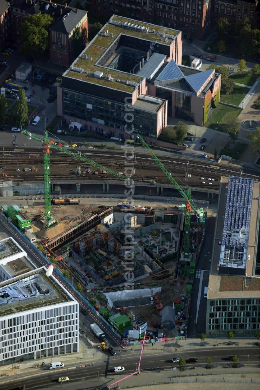 Aerial photograph Berlin - Construction site for the new building of the House of the Future on Kapelleufer riverbank in Berlin in Germany. The building is being built after a design by Richter und Musikowski between the seat of the BMBF ministery and the office building Humbolthafeneins