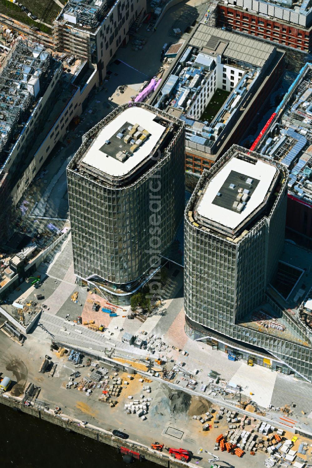 Hamburg from above - Construction site for new high-rise building complex UeBERSEEQUARTIER D1 UND D2 on street New-Orleans-Strasse in the district HafenCity in Hamburg, Germany