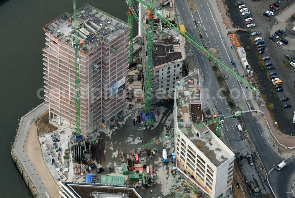 Aerial photograph Hamburg - Construction site for new high-rise building complex des Buero- und Geschaeftshauses WATERMARK der IQ Tower GmbH & Co. KG in the district HafenCity in Hamburg. A joint project of STRABAG Real Estate GmbH and ECE Projektmanagement G.m.b.H. & Co. KG and BAM Deutschland AG