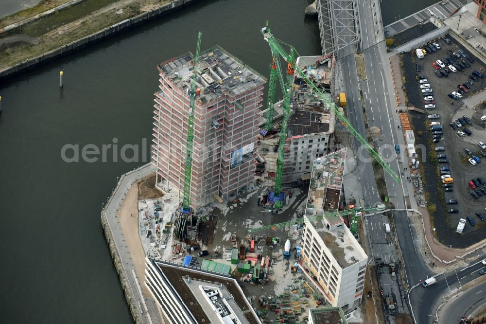 Hamburg from above - Construction site for new high-rise building complex des Buero- und Geschaeftshauses WATERMARK der IQ Tower GmbH & Co. KG in the district HafenCity in Hamburg. A joint project of STRABAG Real Estate GmbH and ECE Projektmanagement G.m.b.H. & Co. KG and BAM Deutschland AG