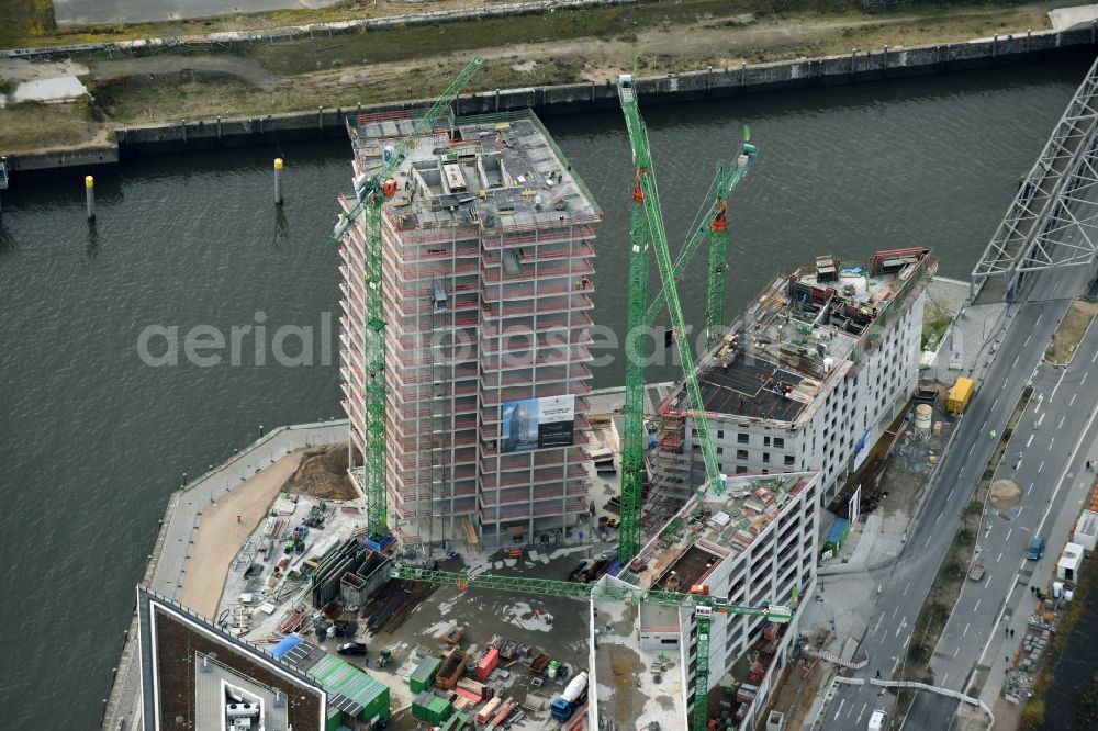 Hamburg from above - Construction site for new high-rise building complex des Buero- und Geschaeftshauses WATERMARK der IQ Tower GmbH & Co. KG in the district HafenCity in Hamburg. A joint project of STRABAG Real Estate GmbH and ECE Projektmanagement G.m.b.H. & Co. KG and BAM Deutschland AG