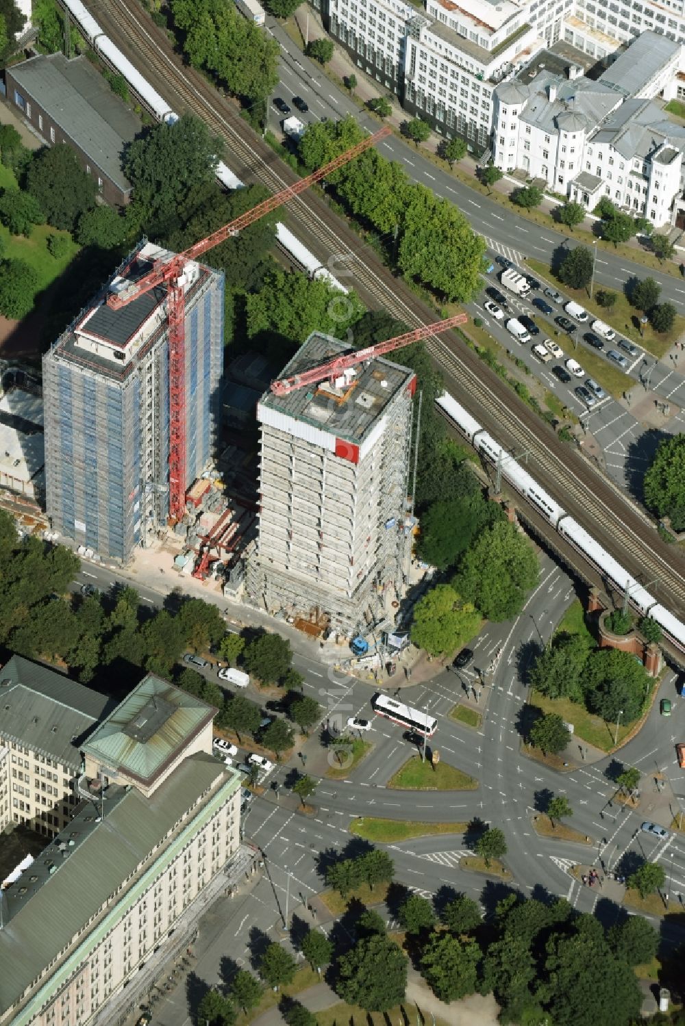 Hamburg from the bird's eye view: Construction site for new high-rise building complex Esplace of Becken Development GmbH between Esplanade and Gustav-Mahler-Park in Hamburg