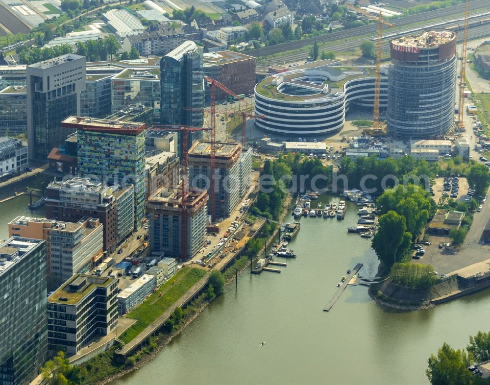 Düsseldorf from above - Construction site for new high-rise building complex Duesseldorfer Heimathafen in of Speditionstrasse in Duesseldorf in the state North Rhine-Westphalia, Germany