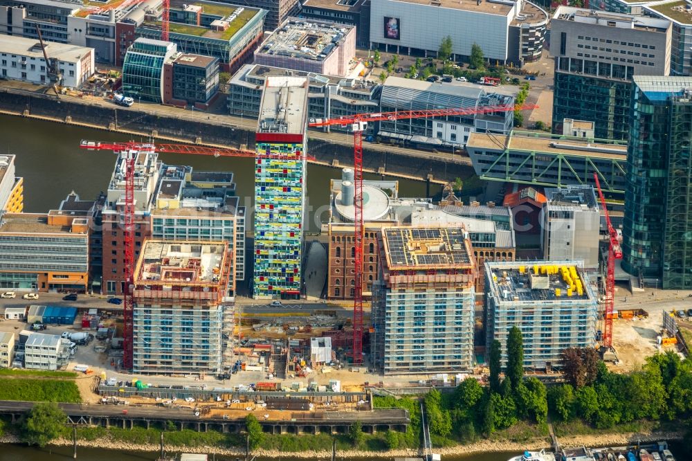 Aerial image Düsseldorf - Construction site for new high-rise building complex Duesseldorfer Heimathafen in of Speditionstrasse in Duesseldorf in the state North Rhine-Westphalia, Germany