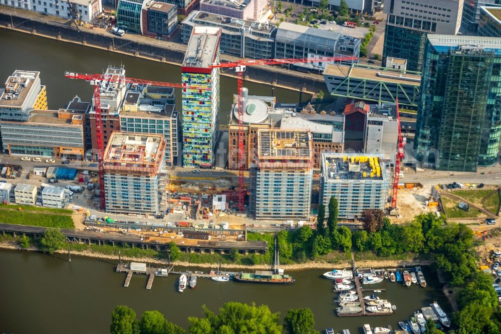 Aerial photograph Düsseldorf - Construction site for new high-rise building complex Duesseldorfer Heimathafen in of Speditionstrasse in Duesseldorf in the state North Rhine-Westphalia, Germany