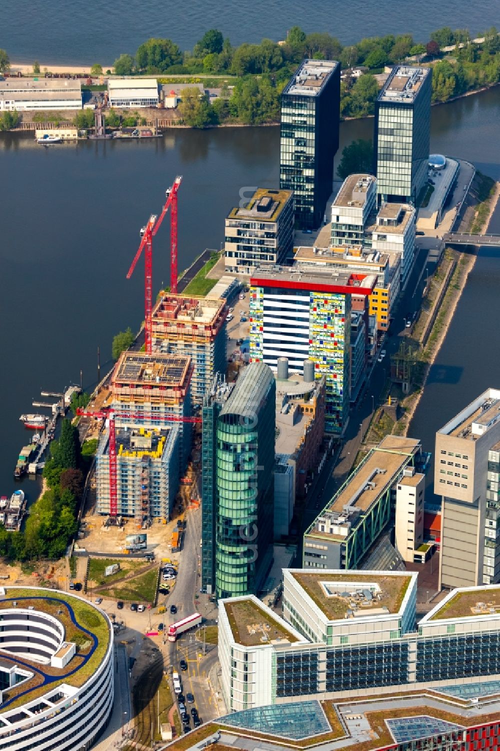 Aerial photograph Düsseldorf - Construction site for new high-rise building complex Duesseldorfer Heimathafen in of Speditionstrasse in Duesseldorf in the state North Rhine-Westphalia, Germany