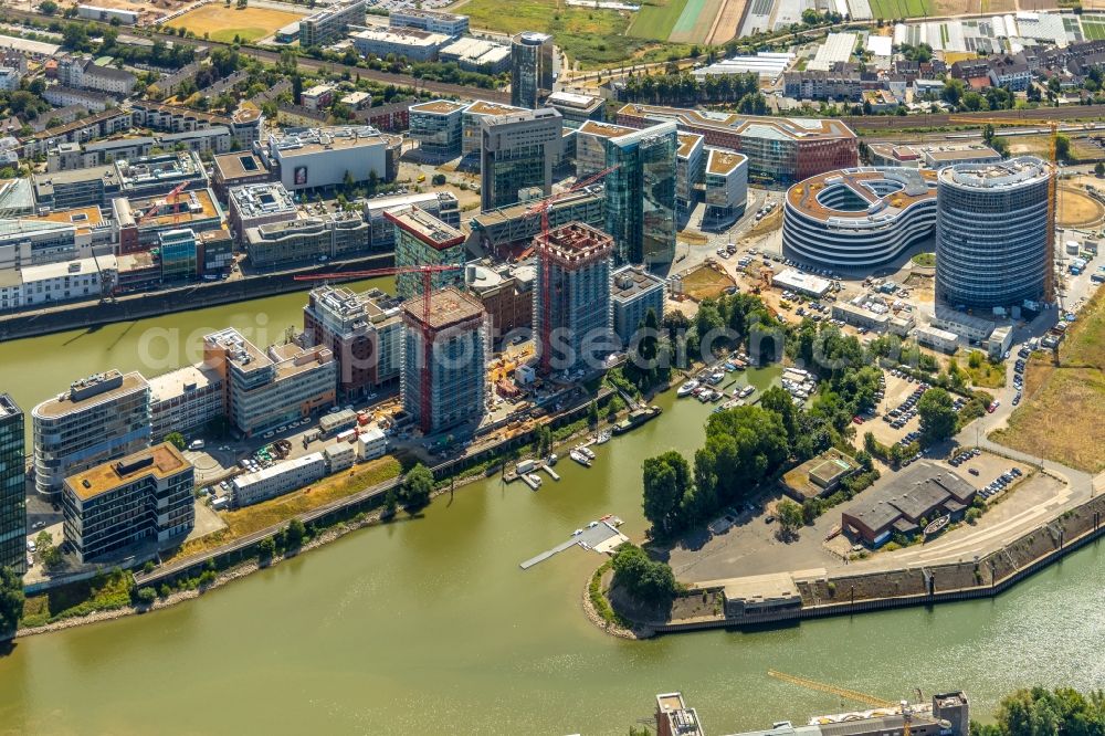 Aerial photograph Düsseldorf - Construction site for new high-rise building complex Duesseldorfer Heimathafen in of Speditionstrasse in Duesseldorf in the state North Rhine-Westphalia, Germany