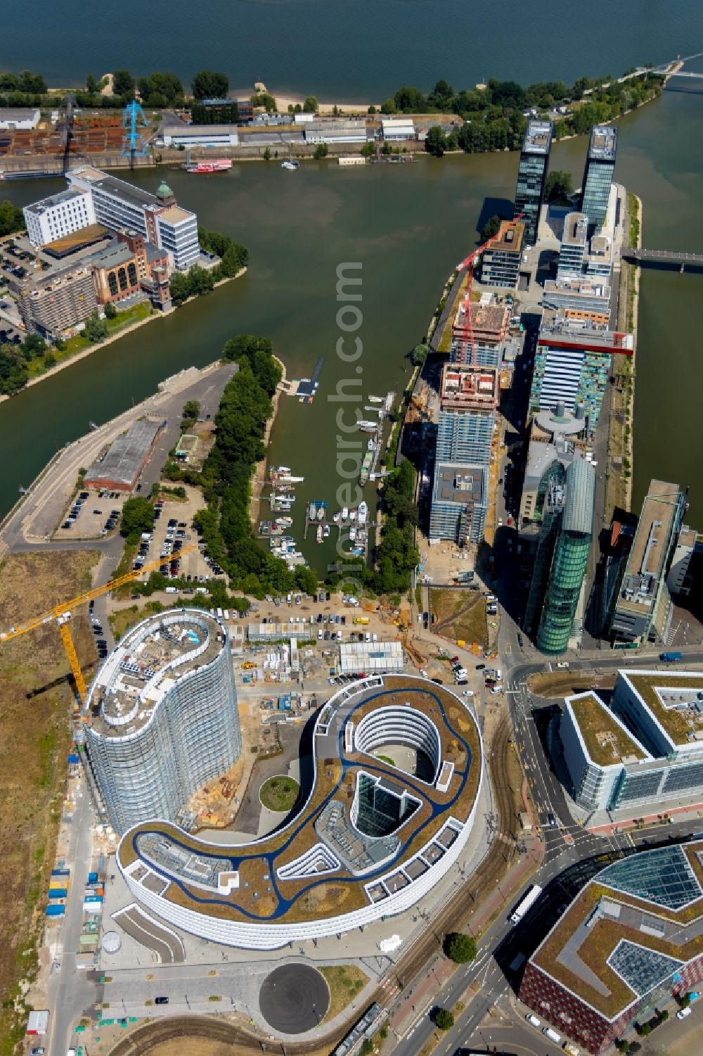 Aerial image Düsseldorf - Construction site for new high-rise building complex Duesseldorfer Heimathafen in of Speditionstrasse in Duesseldorf in the state North Rhine-Westphalia, Germany