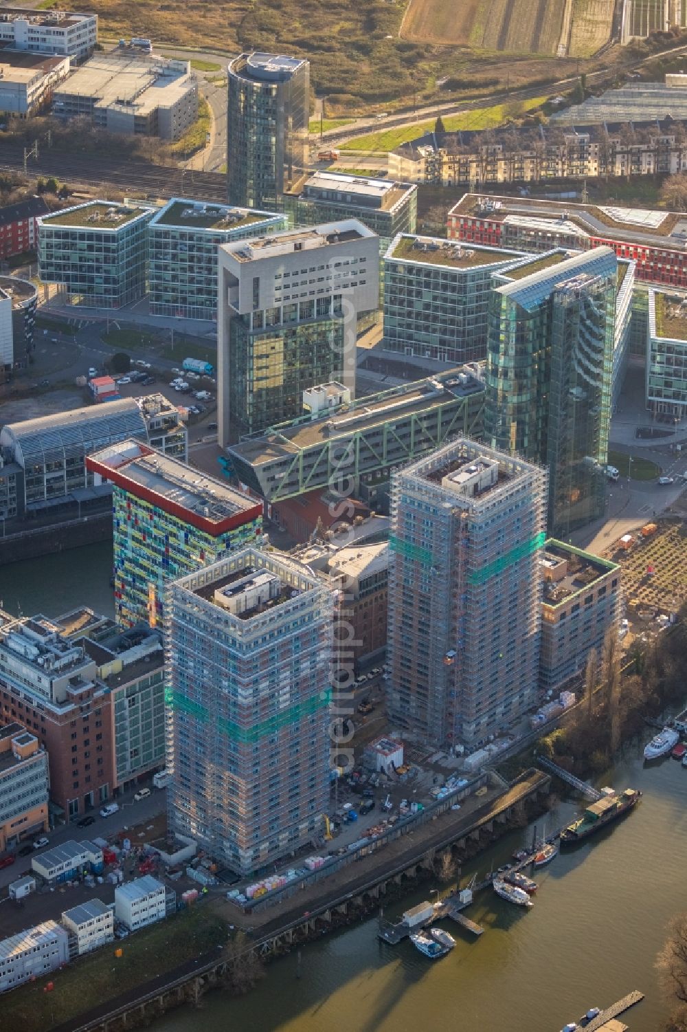 Aerial photograph Düsseldorf - Construction site for new high-rise building complex Duesseldorfer Heimathafen in of Speditionstrasse in Duesseldorf in the state North Rhine-Westphalia, Germany