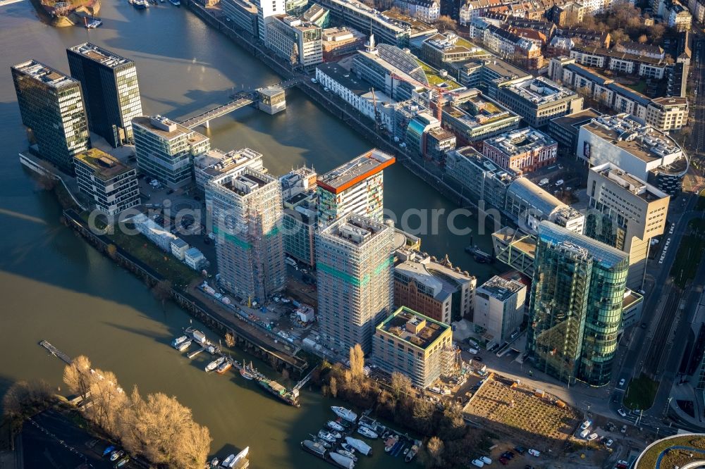 Aerial image Düsseldorf - Construction site for new high-rise building complex Duesseldorfer Heimathafen in of Speditionstrasse in Duesseldorf in the state North Rhine-Westphalia, Germany